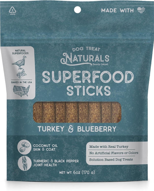 Package of Dog Treat Naturals Superfood Sticks with turkey and blueberry flavor on a blue background.