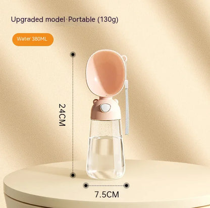 Mimarta pink plastic portable dog water bottle with 380ml clear reservoir, scoop bowl, and white wrist strap.