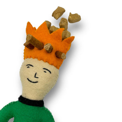 Felt Prince dog toy with orange crown. Features holes for tucking in dog treats for interactive play.