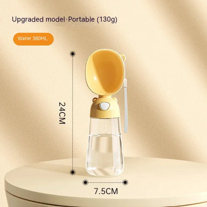 Mimarta yellow 380ml portable dog water bottle with clear plastic reservoir, integrated bowl, and wrist strap.