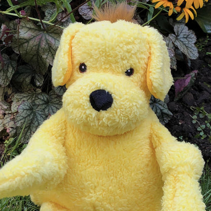 Yellow fuzzy plush dog toy with a black nose and brown hair tuft, Heirloom Knottie Mutt by Purrfect Pet Kingdom.