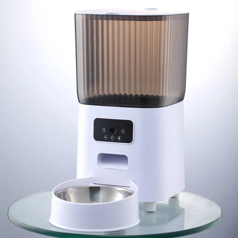 White 5L smart cat feeder with a smoky ribbed tank, dual camera control panel, and stainless steel bowl.
