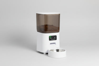 White 5L smart cat feeder featuring a smoky ribbed food tank, stainless steel bowl, and camera on the control panel.