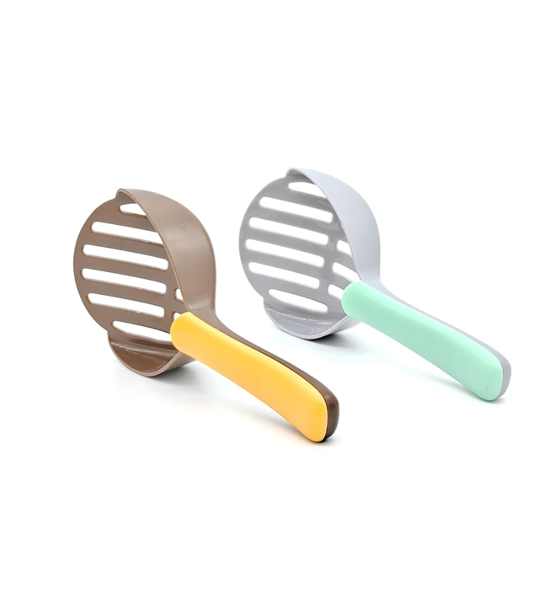 Two kitchen utensils with colorful handles on a white background