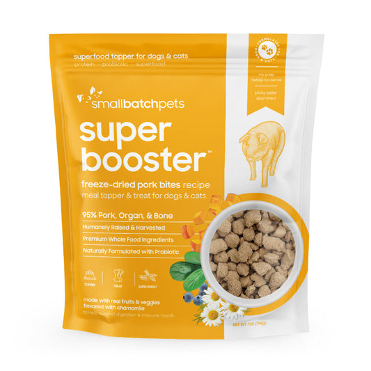 Smallbatch Super Booster freeze-dried pork treats for dogs and cats in a yellow and white stand-up pouch.
