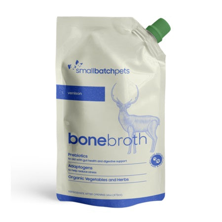 Smallbatch venison bone broth for dogs and cats in a 16 oz beige pouch with blue text, a green cap, and deer graphic.