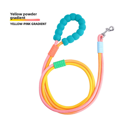 LeonaJ K-9 Co. yellow-pink gradient dual crossbody rope dog leash with teal foam handle and metal swivel clip.
