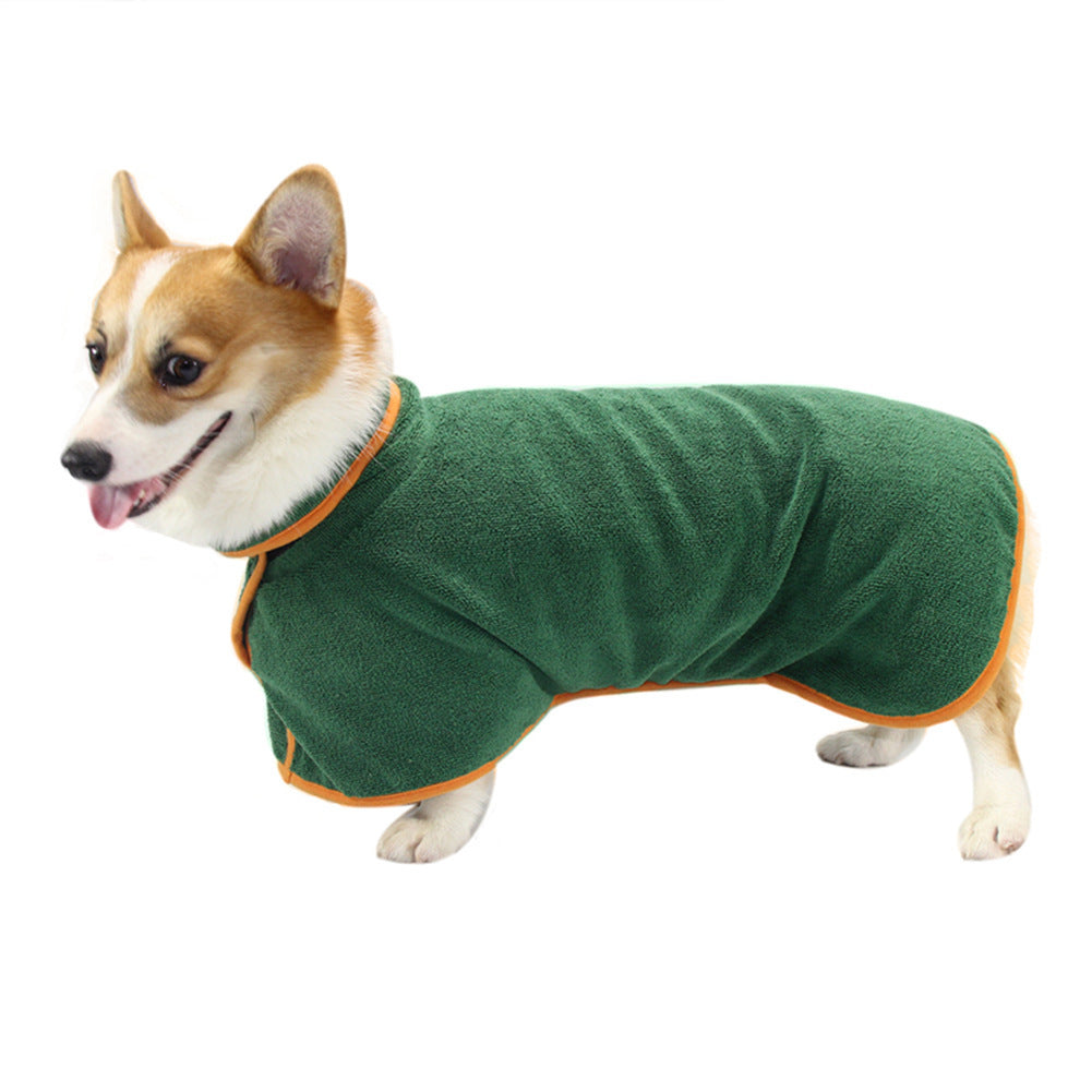Corgi wearing a green absorbent pet bathrobe with orange trim for quick drying after baths