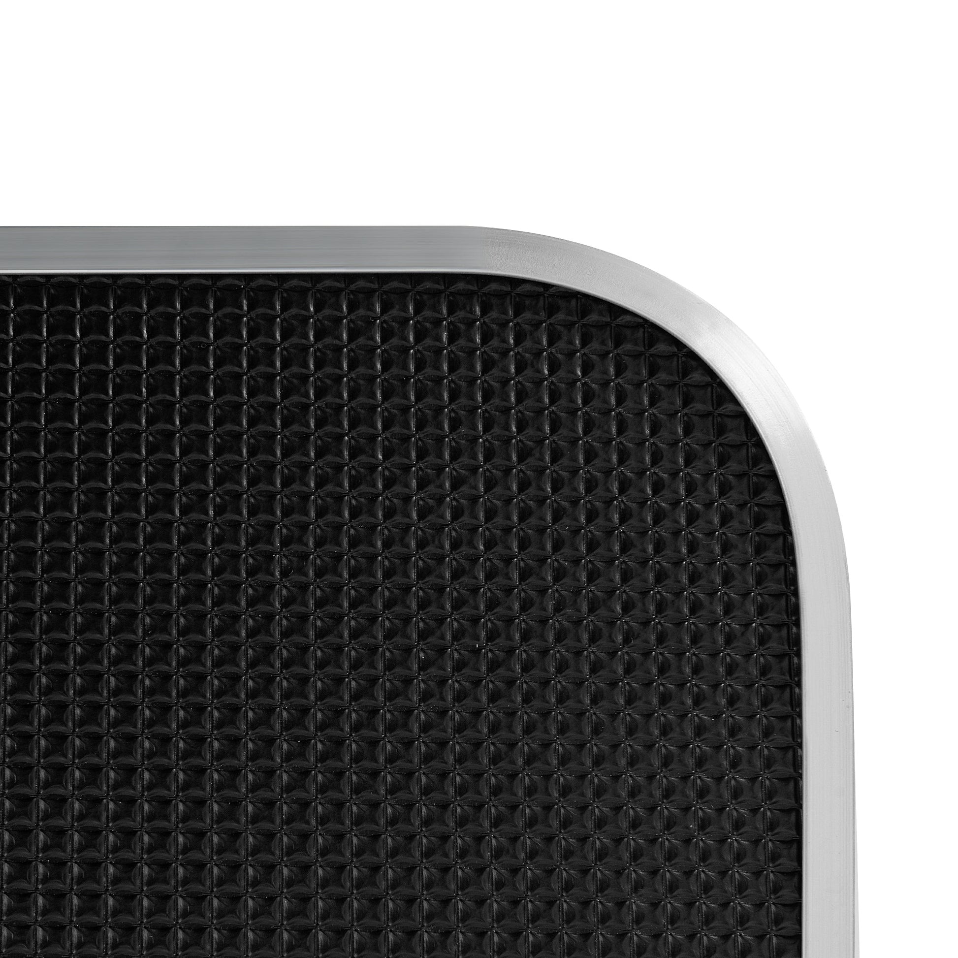 Adjustable dog grooming table with a textured black surface for safe pet grooming