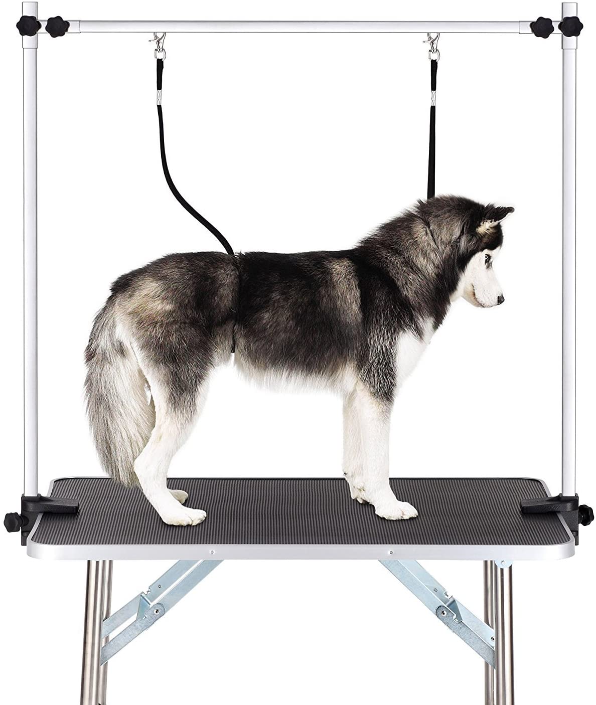 Adjustable dog grooming table featuring a sturdy frame and non-slip surface for pet grooming
