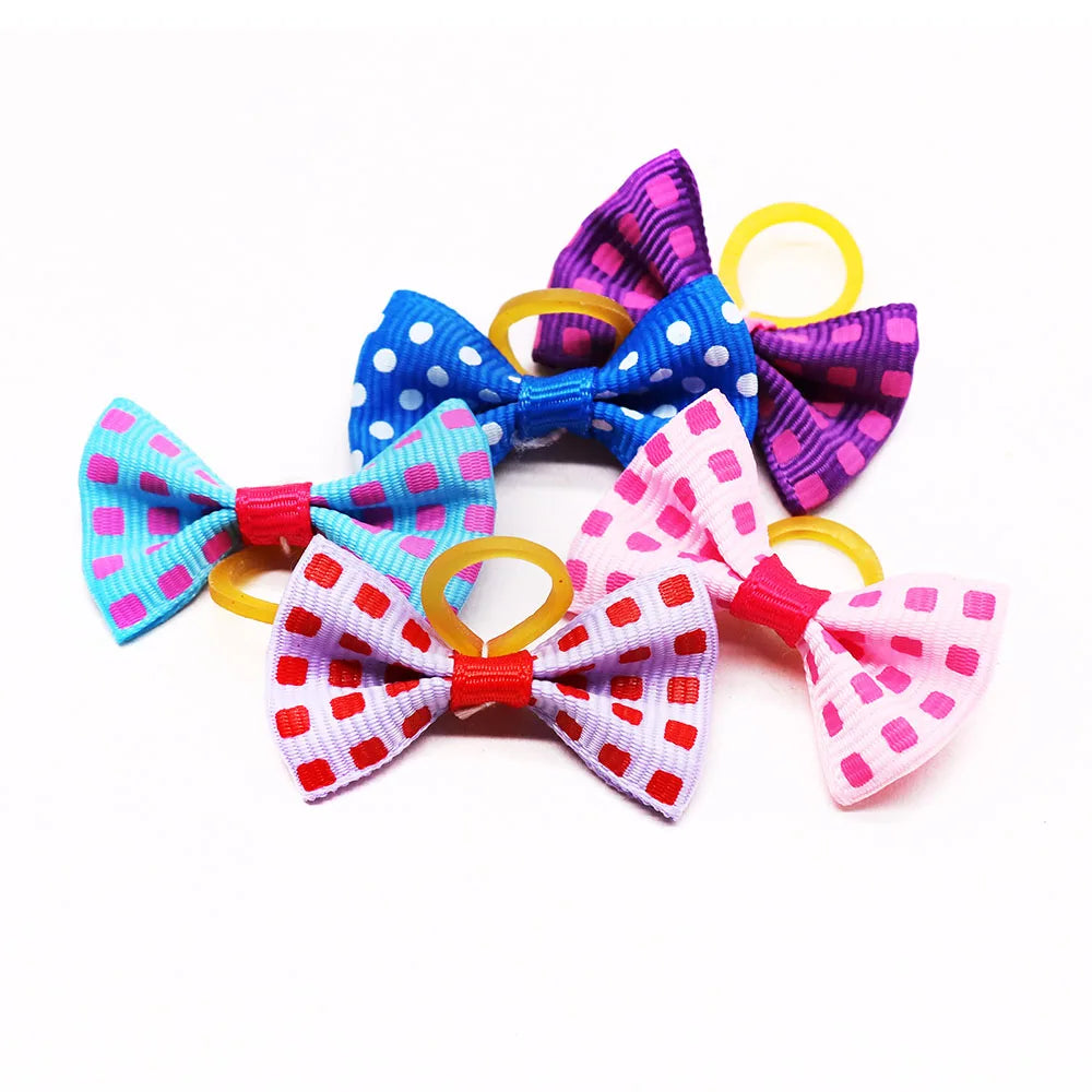 Adorable pet hair bows for dogs in colorful designs with polka dots and check patterns