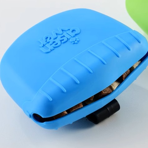 Blue portable pet treat pouch designed for easy access to pet training treats on the go