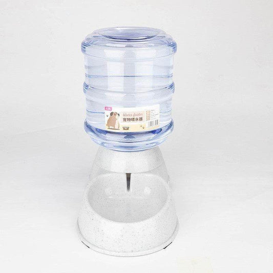 Purrfect Pet Kingdom automatic pet feeder and water dispenser with clear water tank and white base