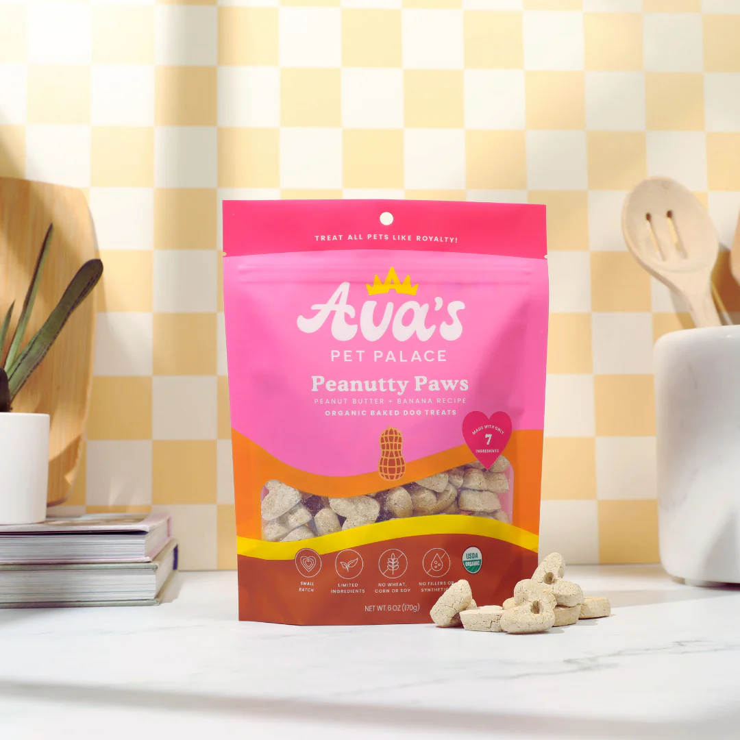 Ava's Pet Palace Peanutty Paws review showing tasty dog treats in a colorful bag on a kitchen counter