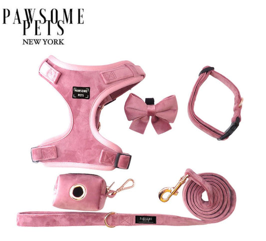 Luxury dog harness and leash set in pink with matching bow and accessory bag for stylish pets