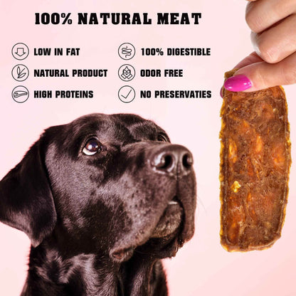 Black dog looking at a hand holding chicken jerky dog treats with natural meat benefits listed