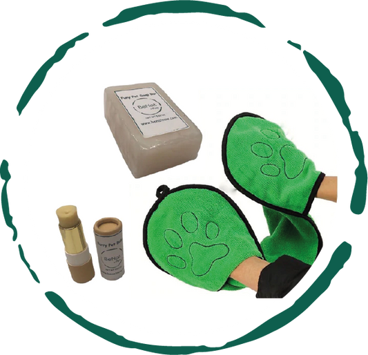 Natural pet grooming products including grooming gloves, soap bar, and deodorizing spray for dogs