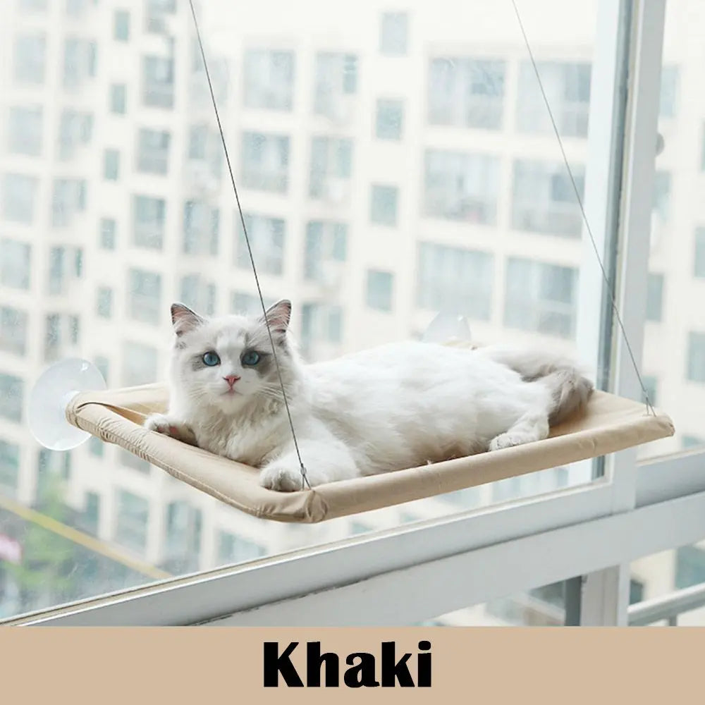 Khaki Purrfect Pet Kingdom elevated perch window seat with white cat resting on the best window seat for cats