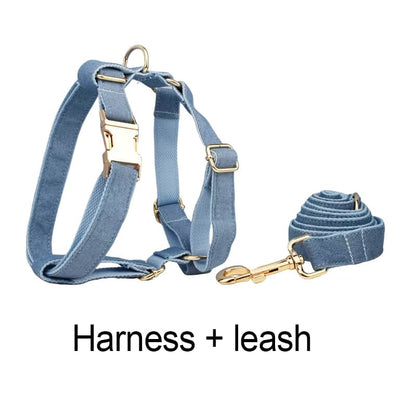 Purrfect Pet Kingdom classic blue denim dog harness and leash set with gold metal hardware and adjustable straps.