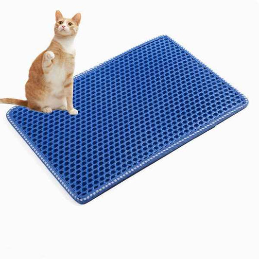 Purrfect Pet Kingdom blue waterproof cat litter mat with honeycomb texture and a cat sitting next to it