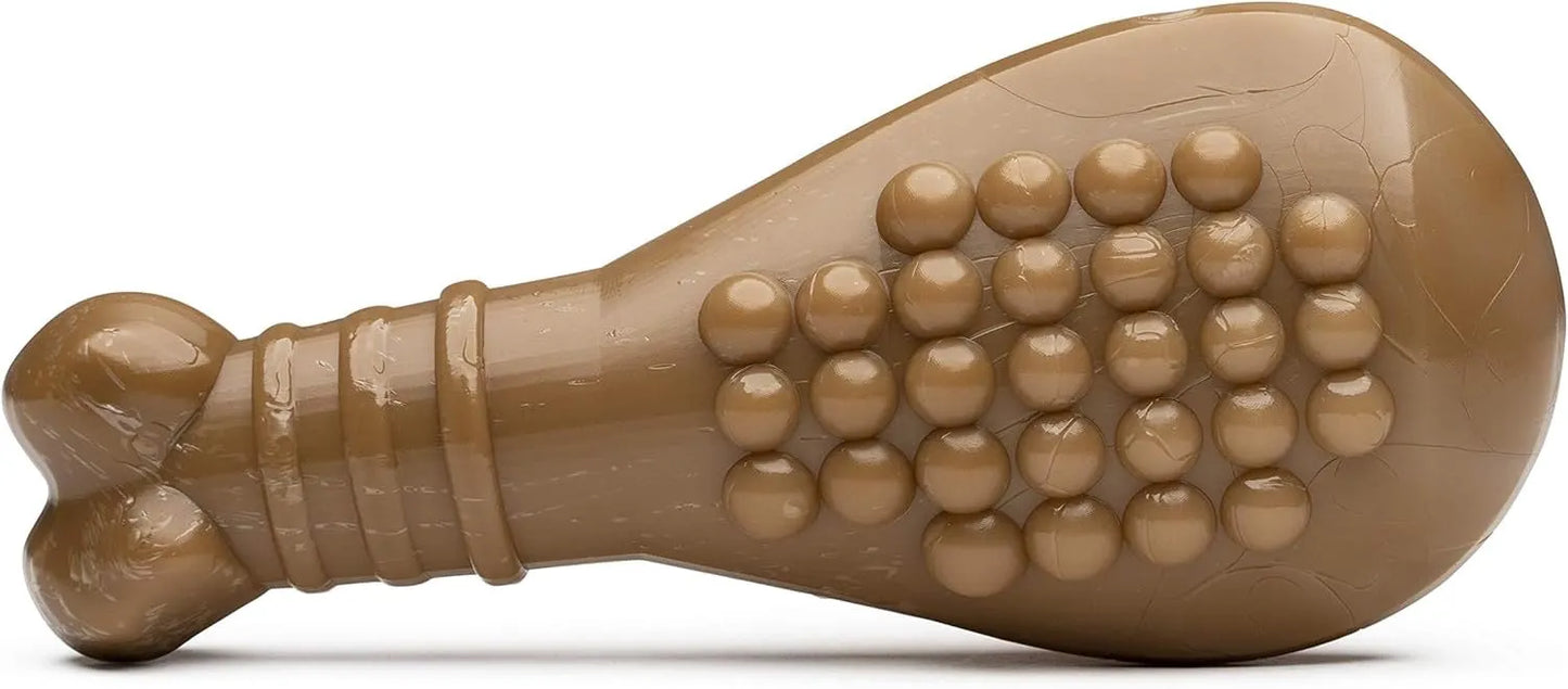 BullyMake Toss N' Treat Turkey Leg Dog Chew Toy by The Family Pet, a durable, chew-friendly treat in a fun turkey leg shape.