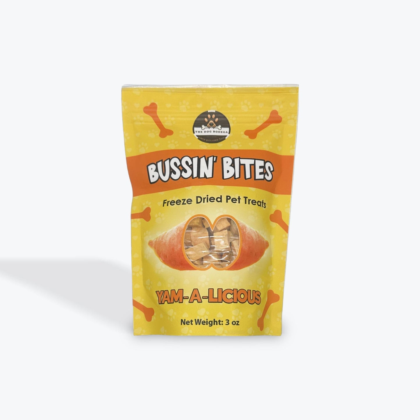 The Dog Bodega Bussin' Bites 3 oz freeze dried sweet potato dog treats in a vibrant yellow bag