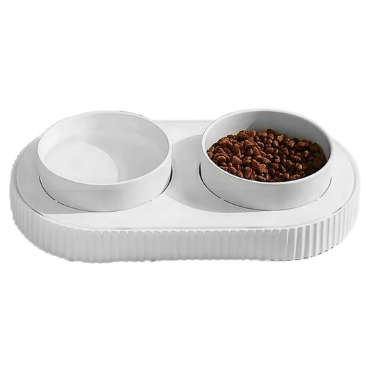 White pet food bowl with two compartments on a white background
