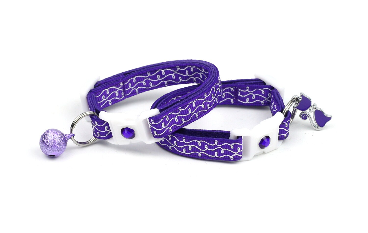 Tail Chasers Purple Cat Collar with Bell for Safety featuring a playful design and adjustable fit