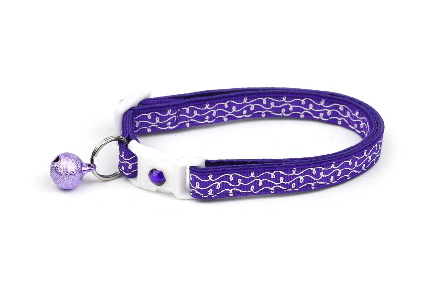 Purple Tail Chasers cat collar with bell for safety, featuring a stylish design and adjustable fit