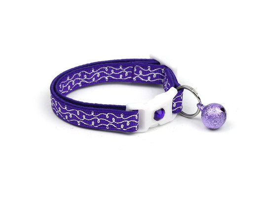 Purple Tail Chasers cat collar with bell for safety featuring a stylish design and adjustable fit