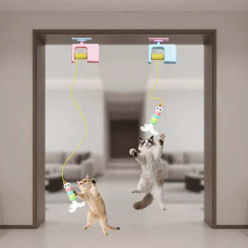 Interactive cat enrichment toys for exercise featuring two playful cats reaching for dangling toys