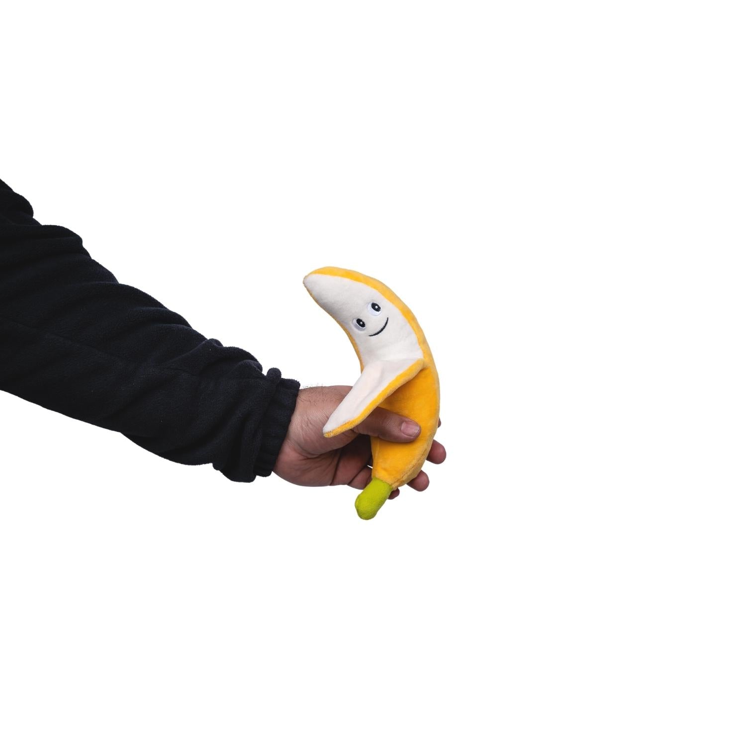 Cute dog toy gift set for puppies featuring a plush banana toy held by a person