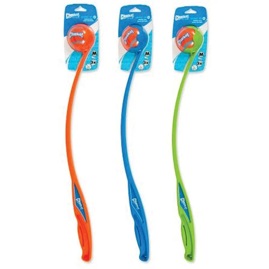 K9 Outdoors long throw dog ball launcher set in orange, blue, and green for fun outdoor play