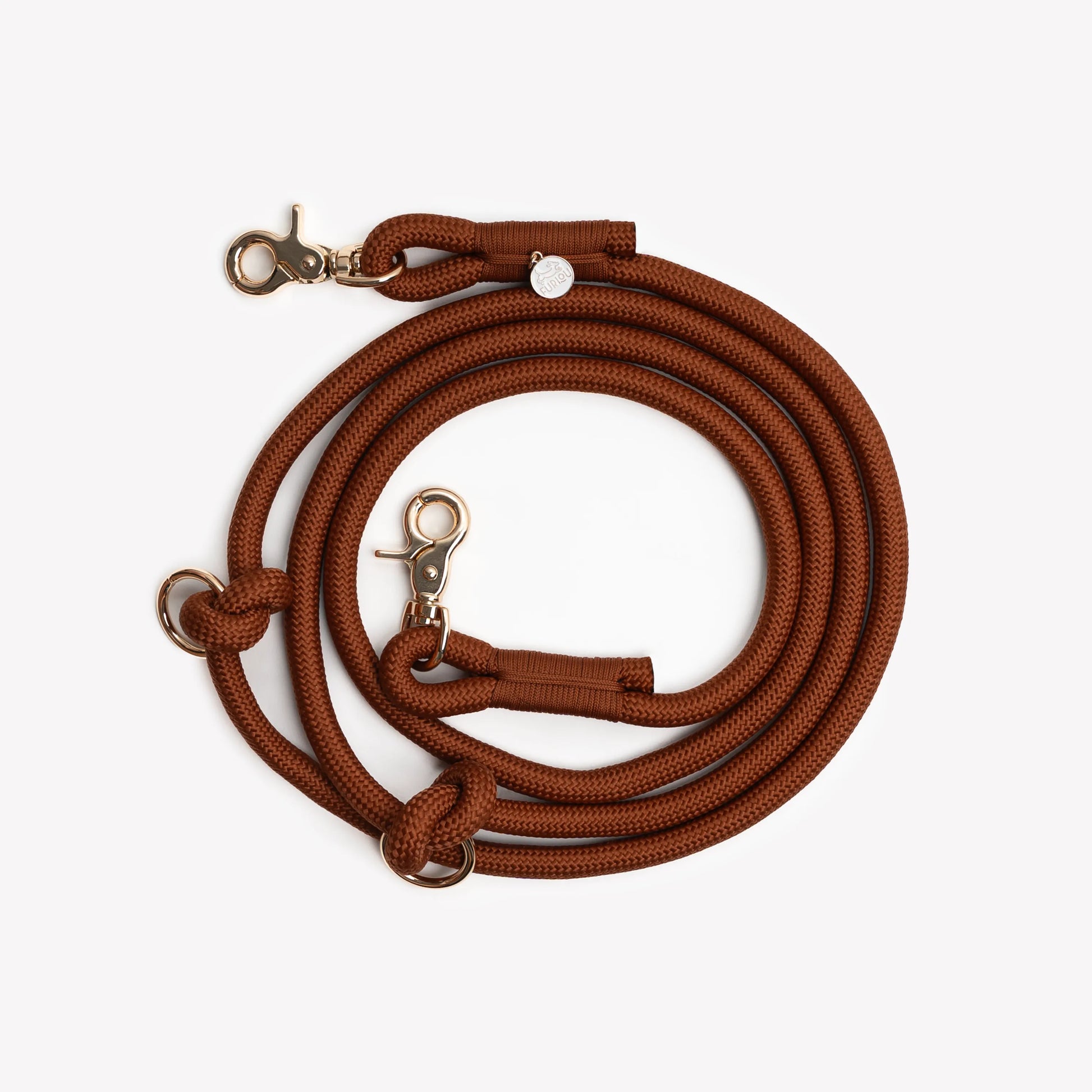 Hands-free braided leash in clay color by FURLOU, perfect for walking dogs, featuring a comfortable design and durable mat...