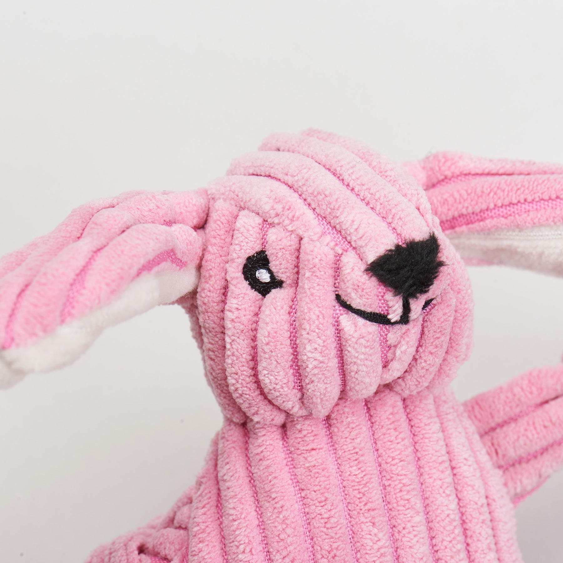 Pink corduroy plush rabbit cat toy with stitched black face and white inner ears from Purrfect Pet Kingdom.