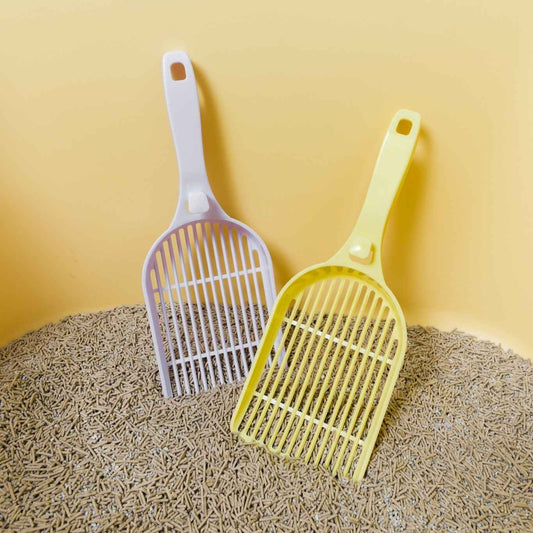 MangoPets Litter Scoops in purple and yellow, the best scoop for clumping litter