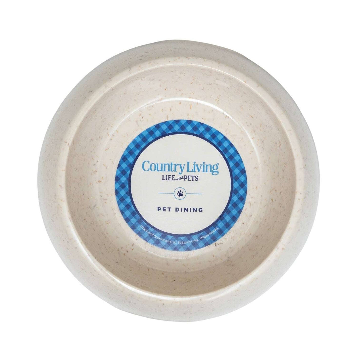 Eco-friendly dog bowl set in a cream color with a blue label for pet dining by Country Living