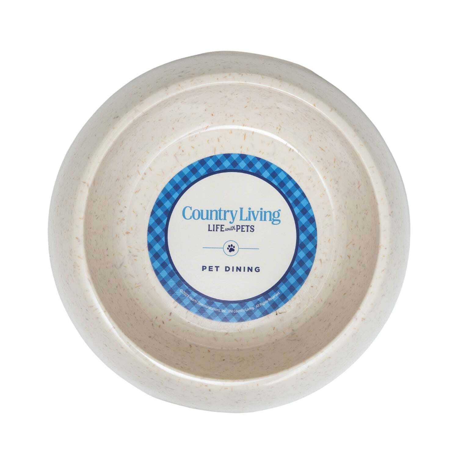 Eco-friendly dog bowl set in a cream color with a blue label for pet dining by Country Living