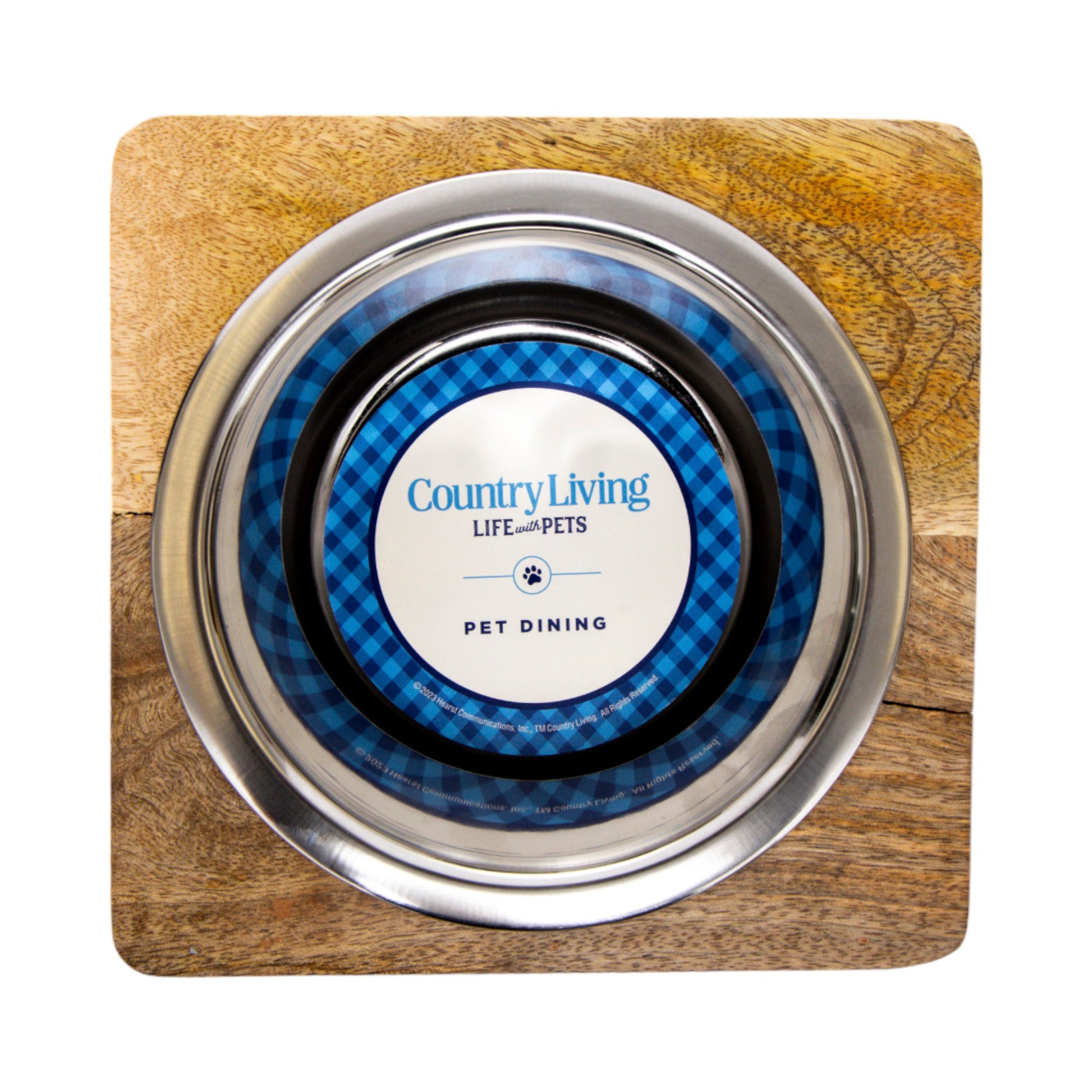 Modern pet feeding station featuring a stainless steel bowl with a blue plaid design for stylish pet dining