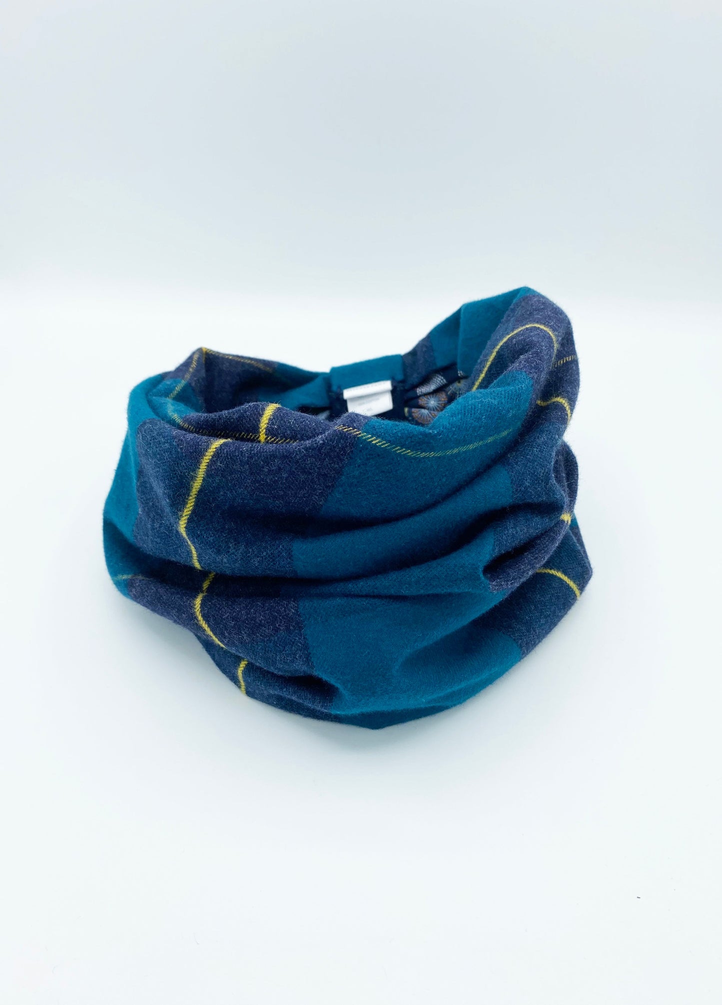 Cozy dog snood for winter in blue with yellow plaid pattern, perfect for keeping pets warm