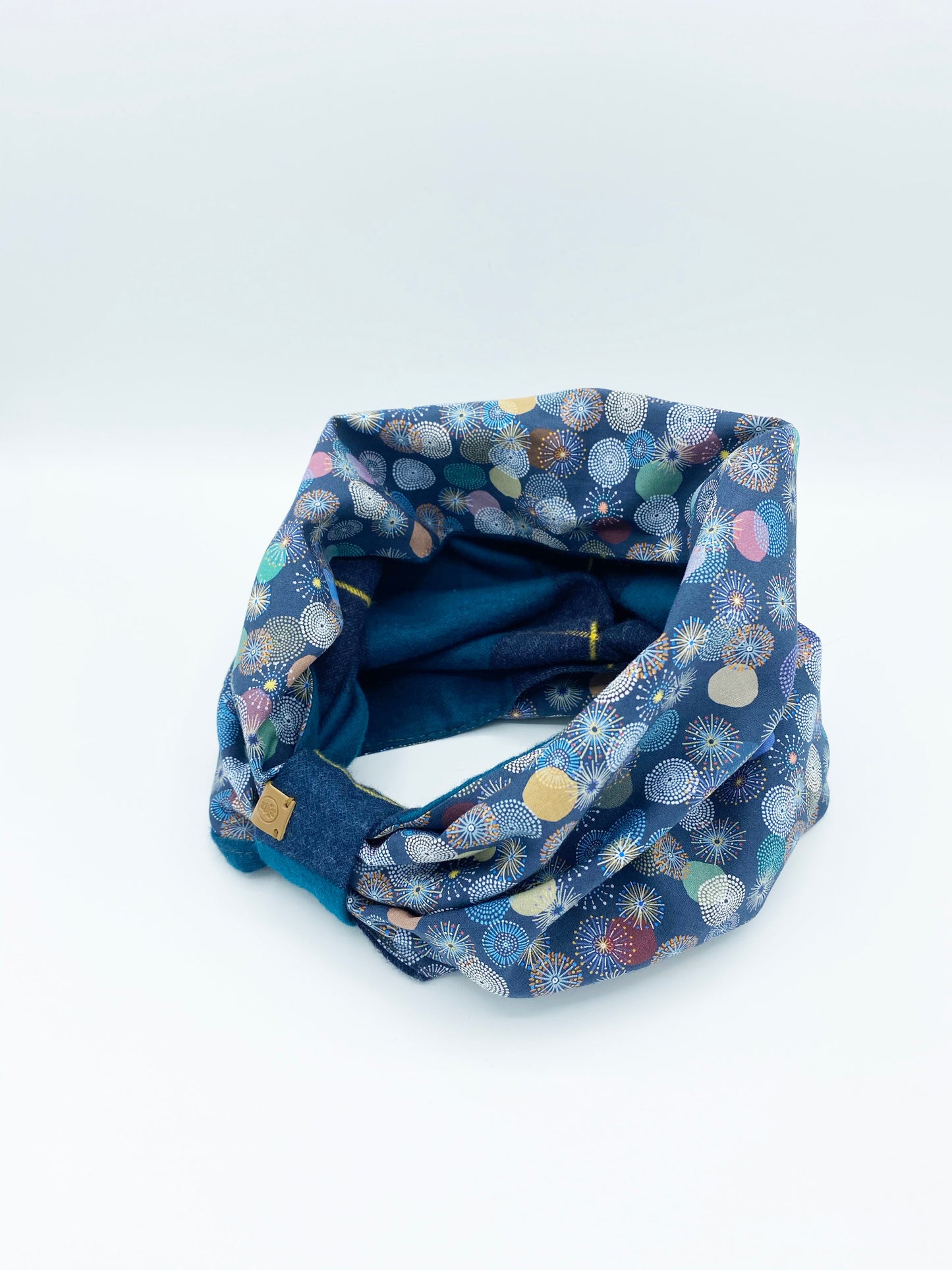 BESPOKE PAWS Cozy dog snood for winter featuring a colorful, patterned design and soft fabric.