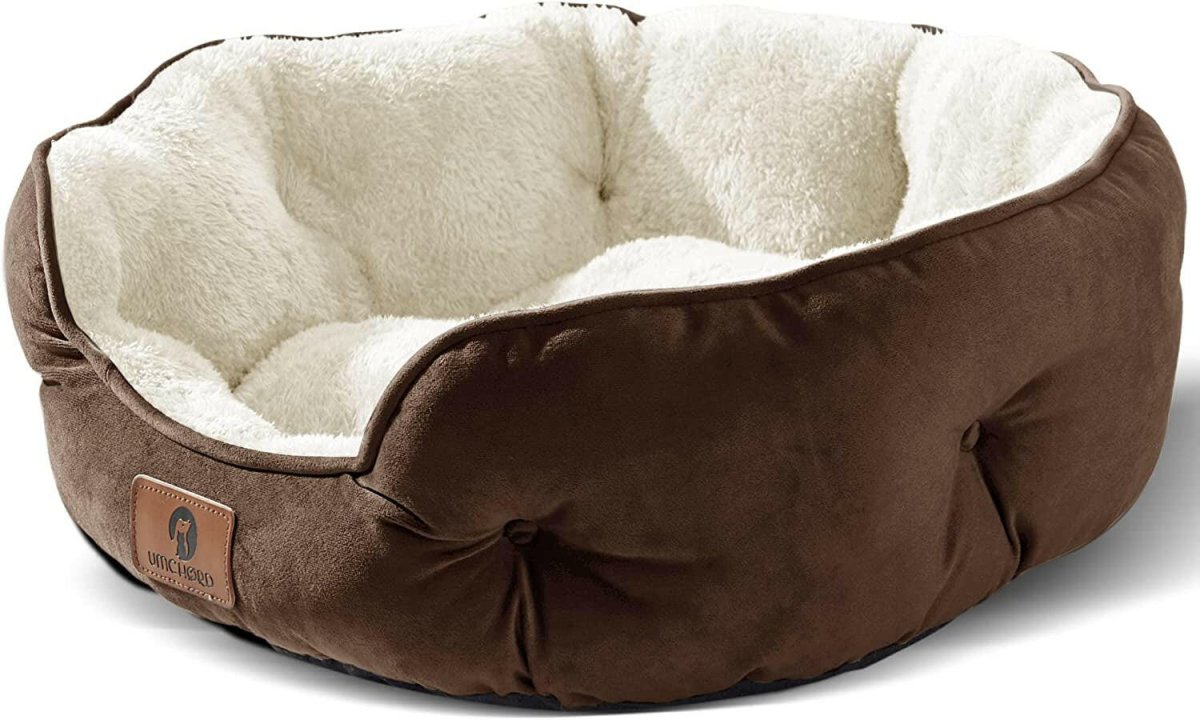 Cozy round bed for small pets in brown with plush interior for ultimate comfort