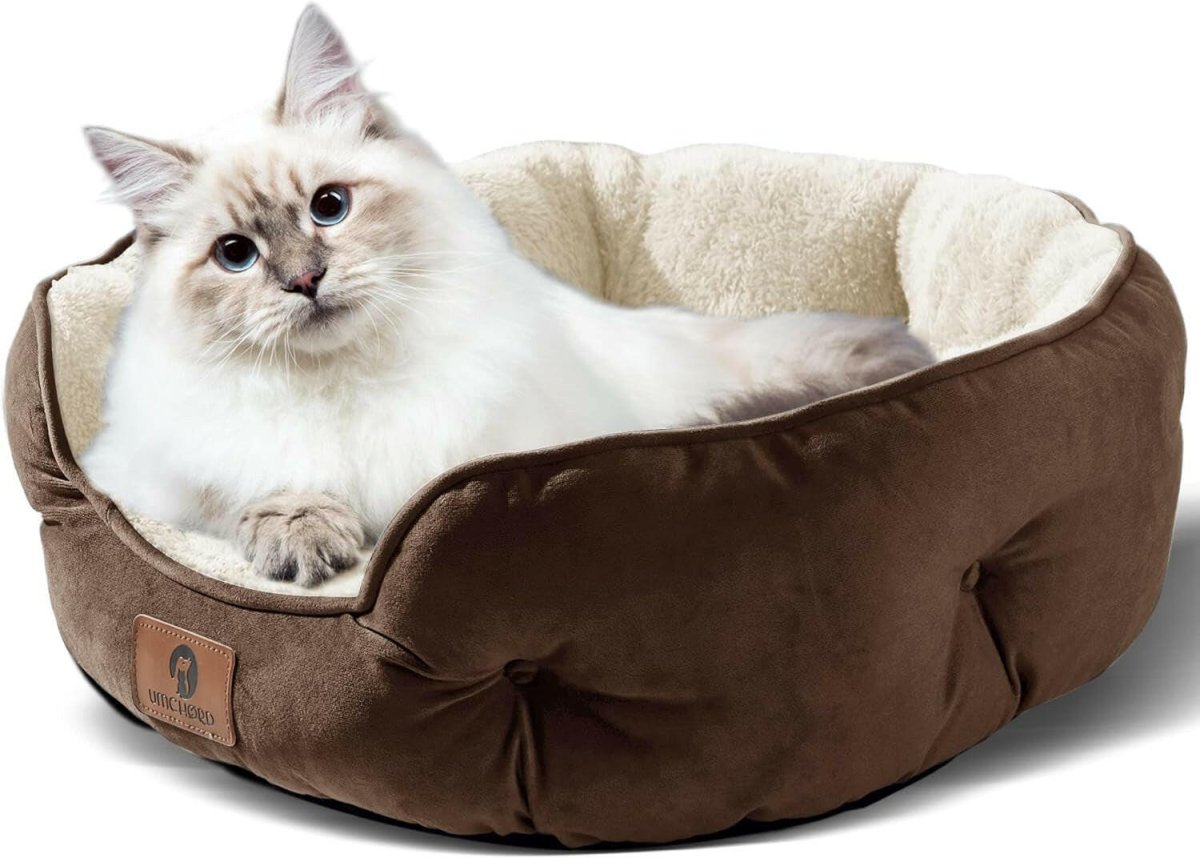 Cozy round bed for small pets in brown with plush interior, perfect for cats and small dogs