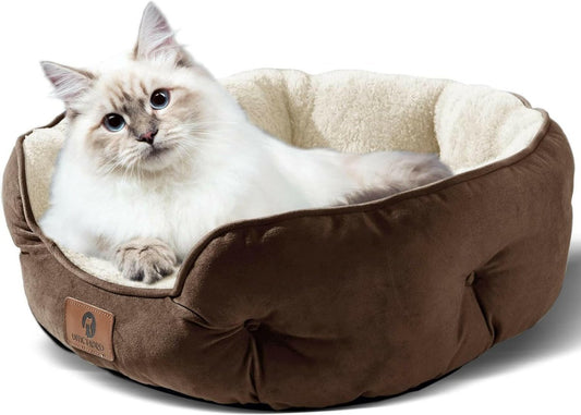 Cozy round bed for small pets in brown with plush interior, perfect for cats and small dogs