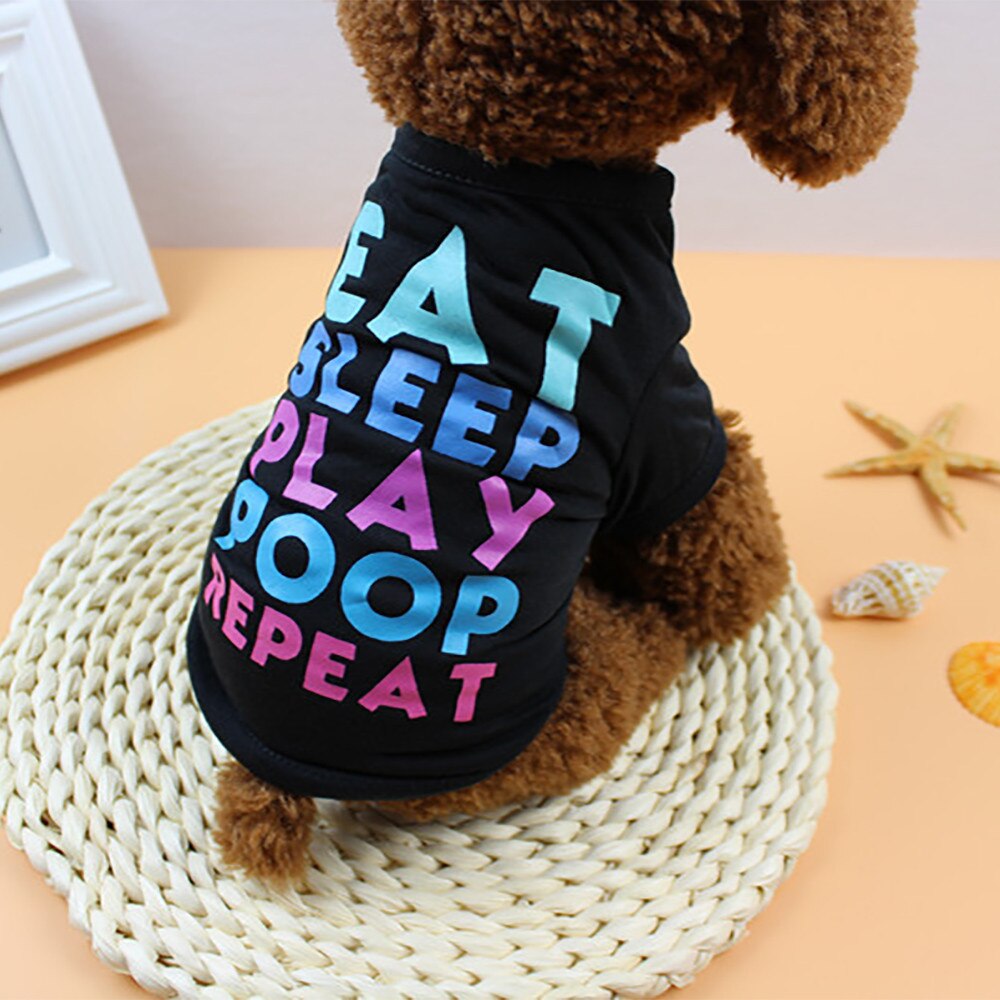 Cute dog shirt with colorful text saying eat sleep play poop repeat for playful pets