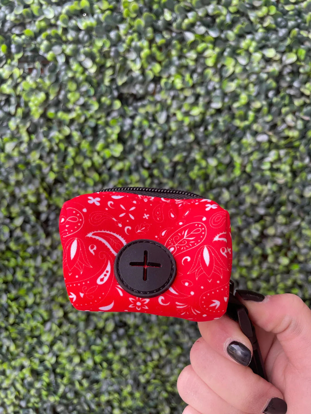 Red paisley neoprene dog poop bag holder by Purrfect Pet Kingdom, featuring an easy clip and designed to hold 1 roll.