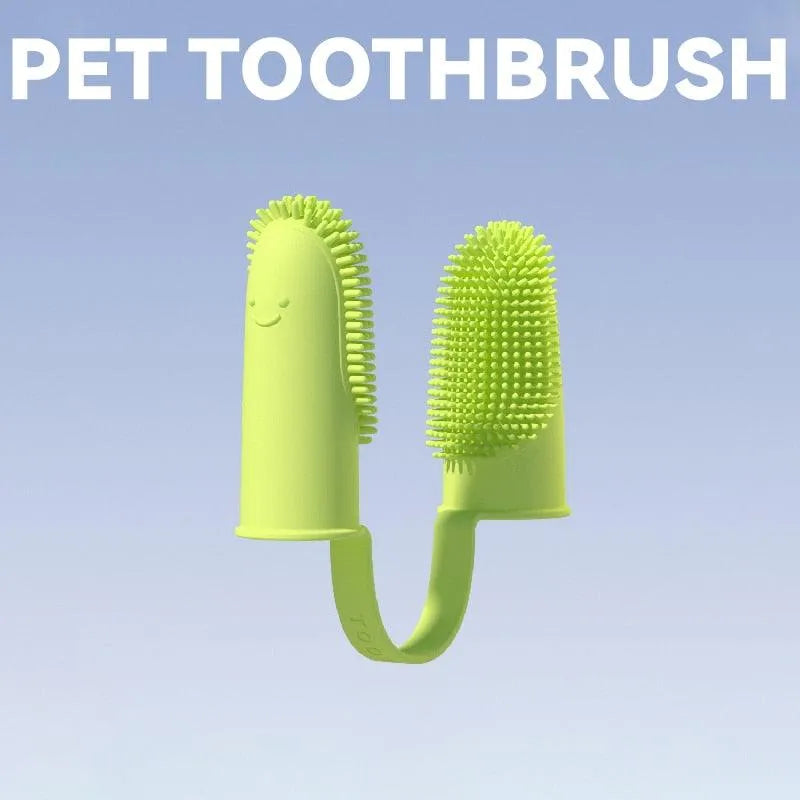Super soft Stevvex dog finger toothbrush in light green, ideal for cleaning teeth and freshening breath for dogs and cats.