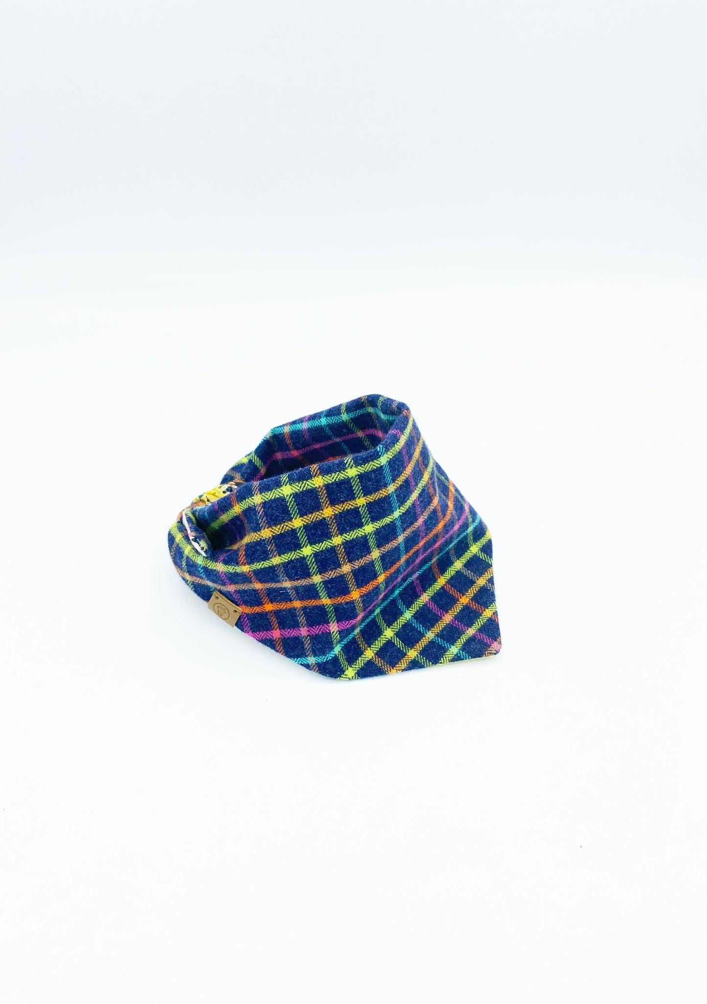 Colorful plaid double-sided dog scarf by Bespoke Paws for stylish pets