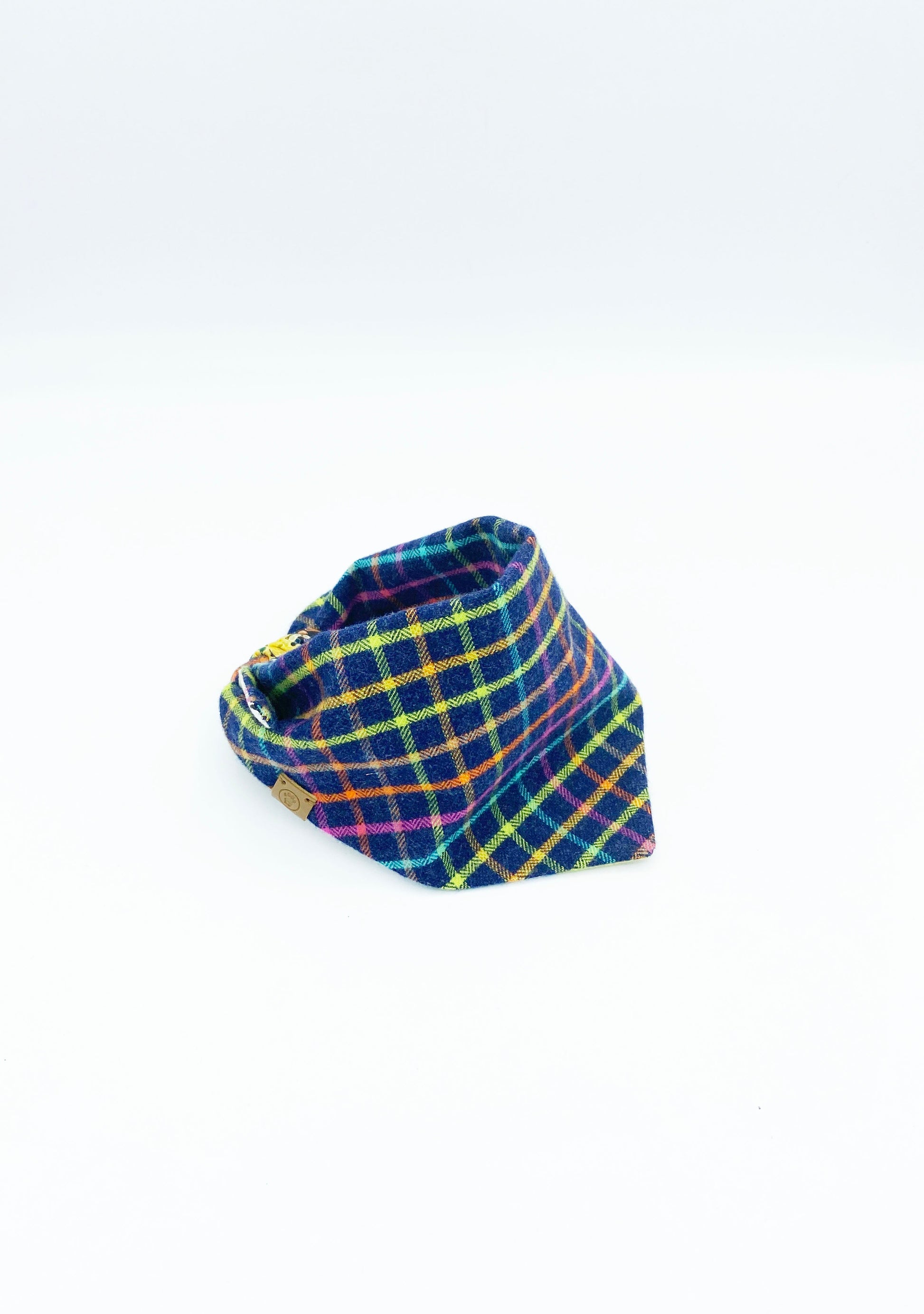 Colorful plaid double-sided dog scarf by Bespoke Paws for stylish pets