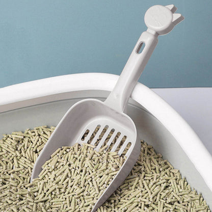 Durable cat litter cleaning tool by Purrfect Pet Kingdom with cat-shaped handle scoop in litter box